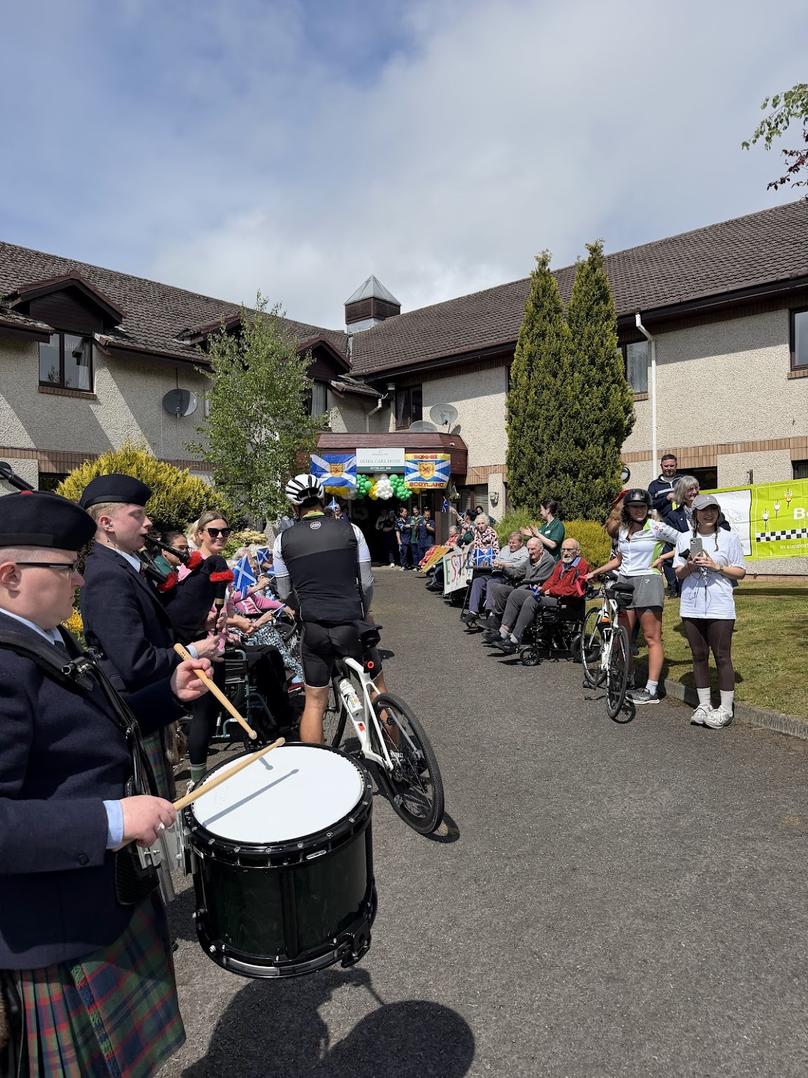 Cyclists arriving at a care home in Scotland